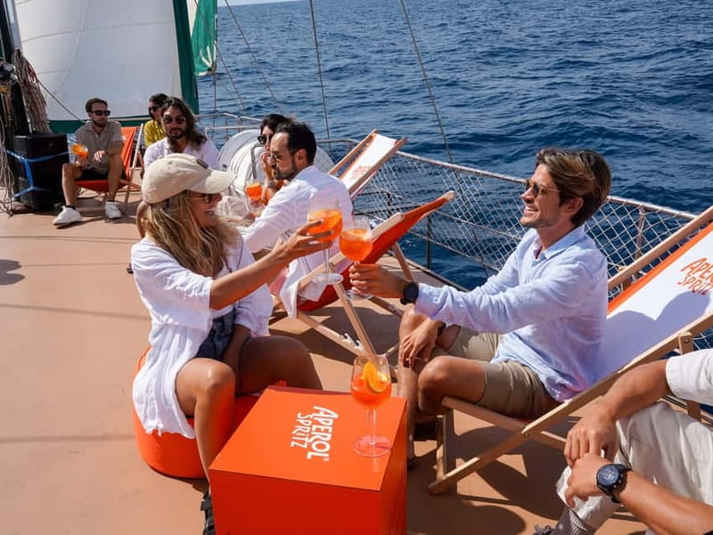 Barcelona: Sunset Sailing Cruise with Live Music - Boarding the wooden Turkish gulet