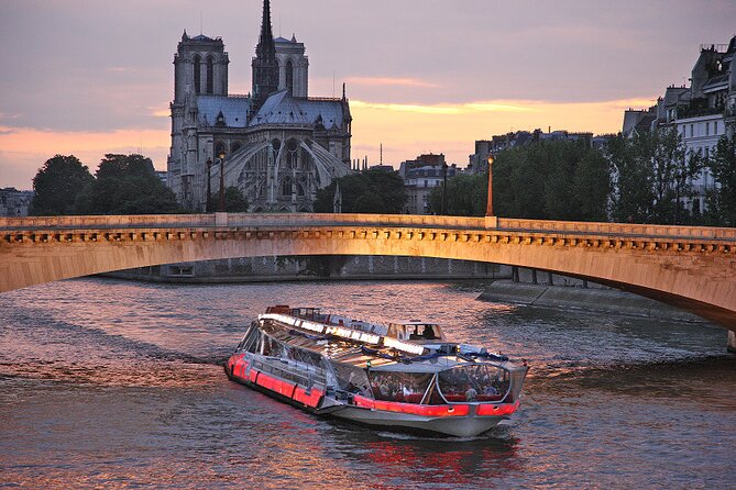 Bateaux Mouches Dinner Cruise on the Seine River in Paris - Pont Neuf, Musée d’Orsay, and the golden dome of Invalides