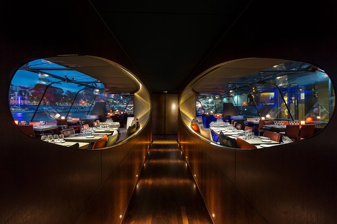 Bateaux Parisiens Seine River Gourmet Dinner & Sightseeing Cruise - Live Music and the Evening Atmosphere