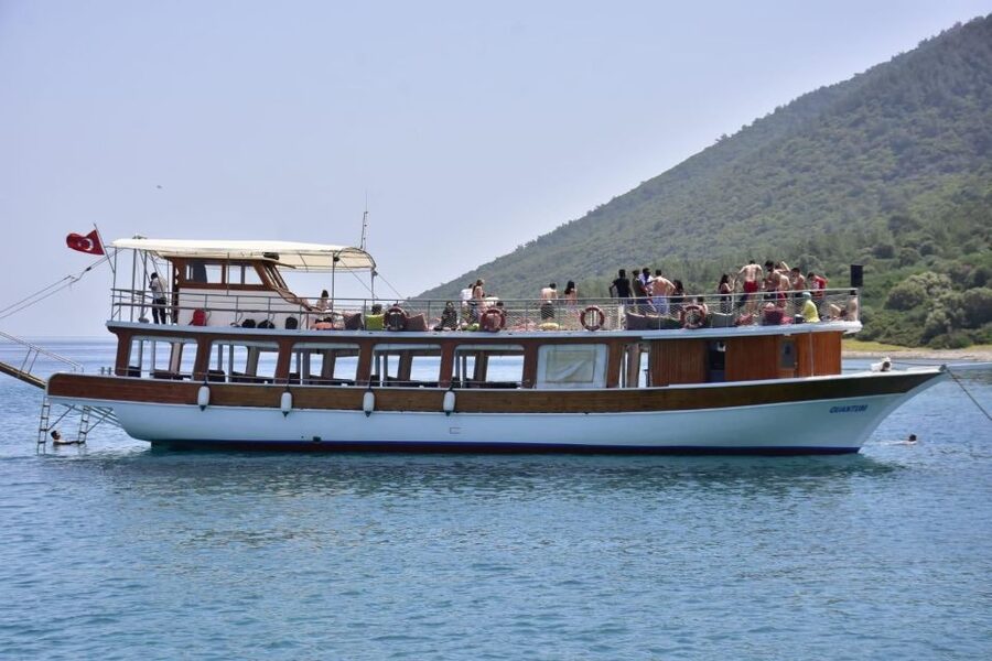 Bodrum: Orak Island Boat Tour with Swim Stops and Lunch - Setting out from Bodrum Harbor