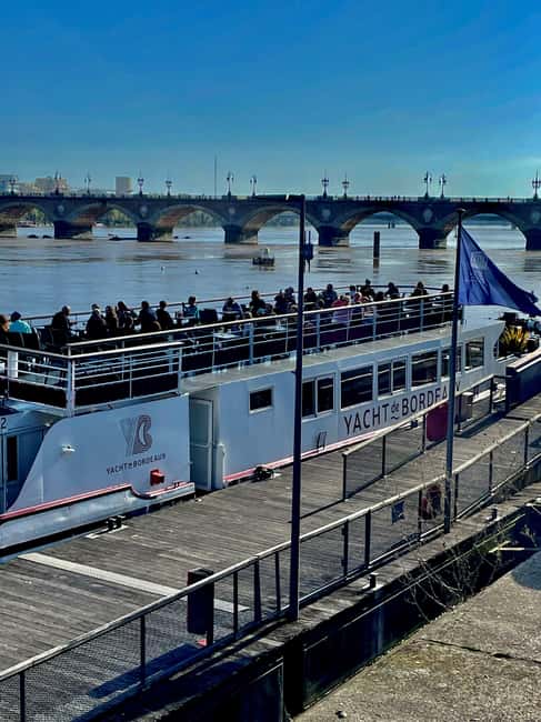 Bordeaux: River Garonne Cruise with Glass of Wine and Canelé - Pont de Pierre and Bordeaux’s grand riverfront