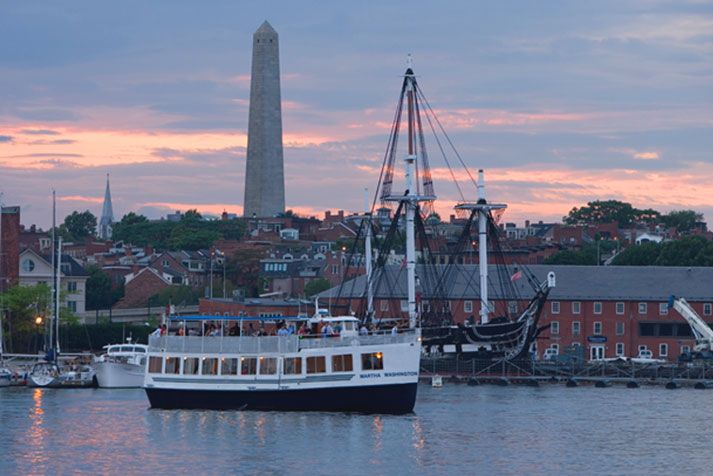 Boston: City Cruises Sunset Skyline Cruise with Commentary - The USS Constitution and the sunset cannon