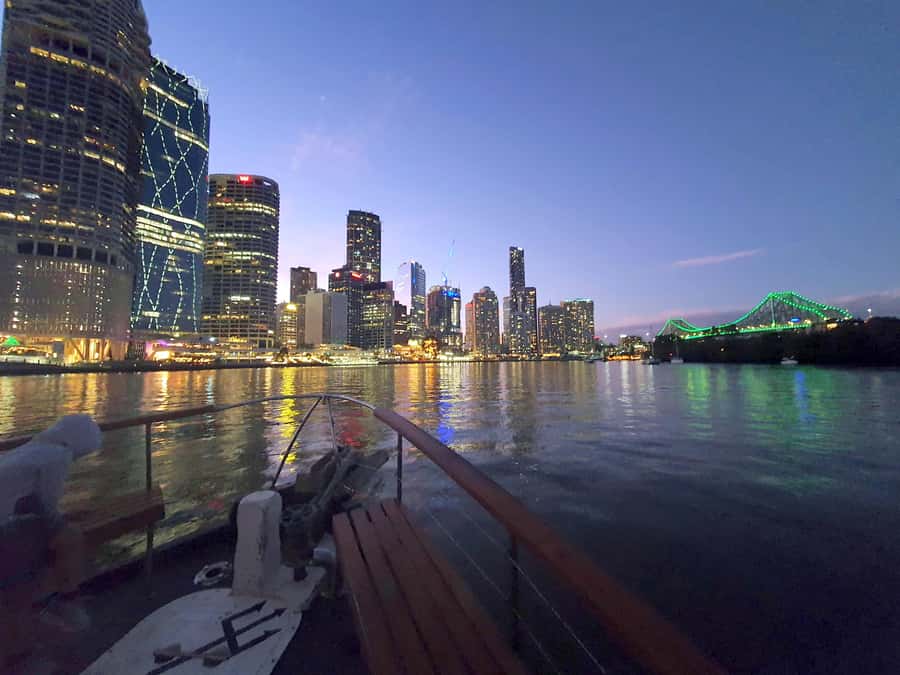 Brisbane: Sunset City Lights Cruise 5.30pm or 6pm <em>seasonal – Key points to know before booking’ /></p>
<ul>
<li><strong>The timing changes with the seasons:</strong> Departures are at 5:30pm from April 1 to September 30, and at 6pm from October 1 to March 31.</li>
<li><strong>The best views come during the change from daylight to darkness:</strong> You may see sunset colors first, then the city lights on the return.</li>
<li><strong>A complimentary charcuterie board is included:</strong> Drinks and extra snacks cost more at the onboard bar.</li>
<li><strong>The Story Bridge and Kangaroo Cliffs are the visual highlights:</strong> The cruise focuses on Brisbane River scenery rather than a long list of attractions.</li>
<li><strong>There is music but no regular commentary:</strong> This suits a quiet evening, but it may disappoint anyone wanting local stories.</li>
<li><strong>The meeting point is easy to identify:</strong> Board at the Cultural Centre Public Pontoon in South Bank, 15 minutes before departure.</li>
</ul>
<h2>Setting off from South Bank at sunset</h2>
<p><img width="900" height="703" decoding="async" src=