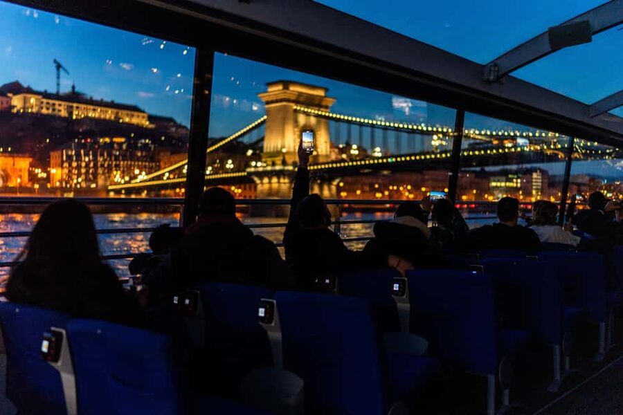 Budapest: 1-Hour Evening Sightseeing Cruise with Drink - The boat: indoor comfort and limited open-air seating