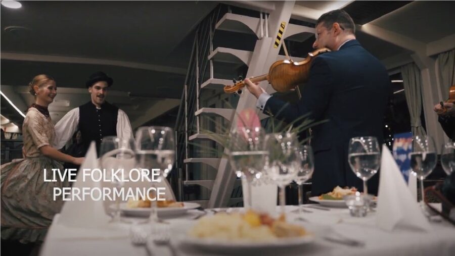 Budapest: 4-Course Dinner River Cruise with Live Folk Music - The boat, seating, and photography