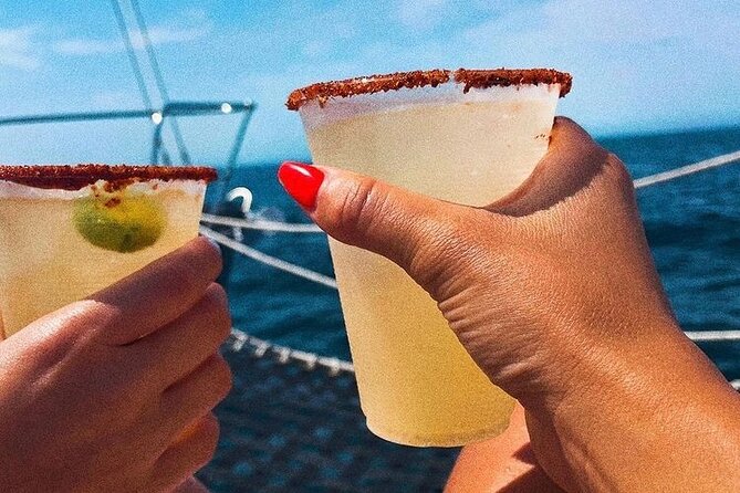 Cabo San Lucas Sunset Cruise with Open Bar and Snacks - Booking, timing, and cancellation details