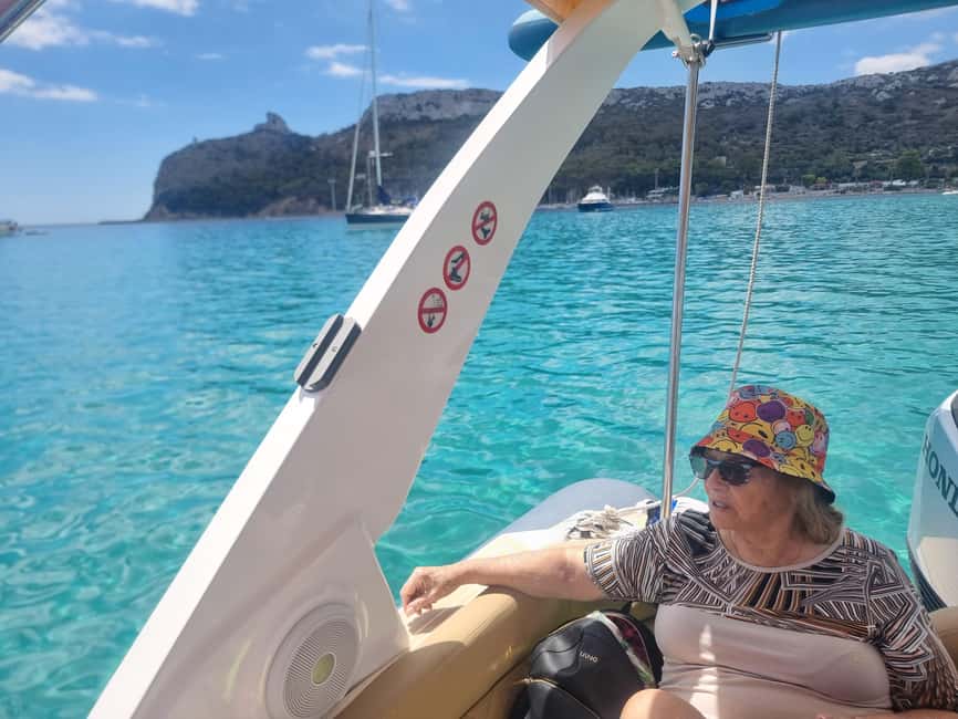Cagliari: Boat Tour, 4 Stops, Swim, Snorkeling, & 1 Spritz - Cala Bernat, a first taste of the clear water