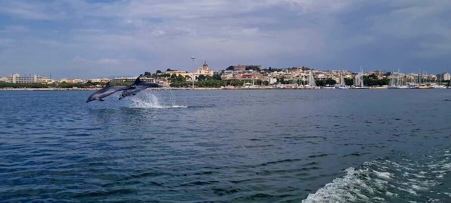 Cagliari: Boat Tour, 4 Stops, Swim, Snorkeling, & 1 Spritz - Meeting the boat near Bacan Cagliari