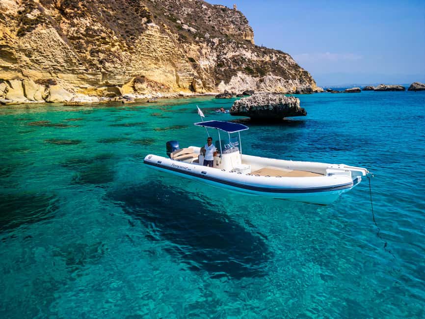 Cagliari: Boat Tour with 5 Snorkeling Stops & Free Drinks - Cala Mosca begins the swimming time