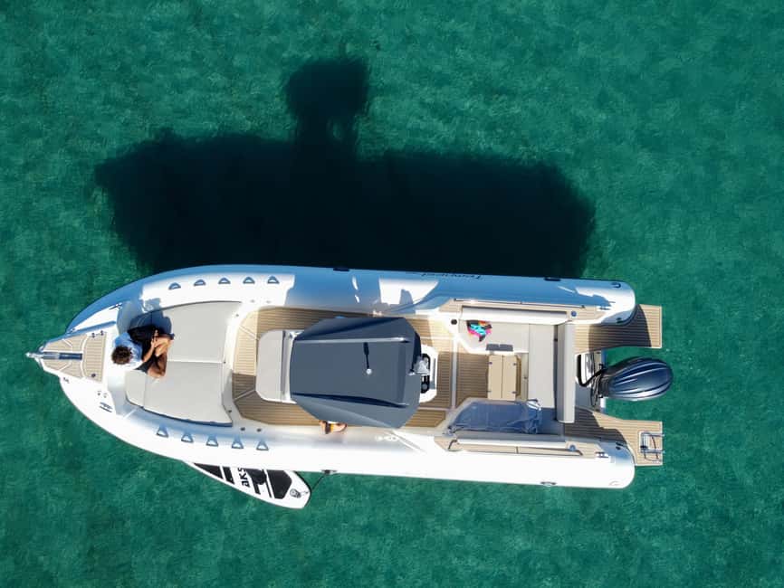 Cagliari: Boat Tour with 5 Snorkeling Stops & Free Drinks - Cala Fighera may be the favorite stop