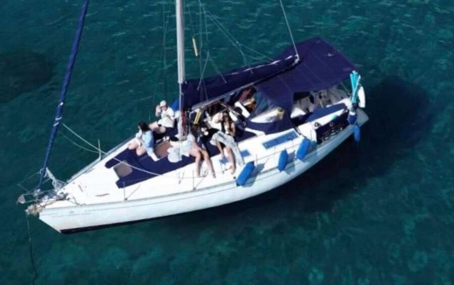 Cagliari: Catamaran Tour, Swimming, Snorkeling, & Prosecco - Cala Mosca: your first swim in clear water