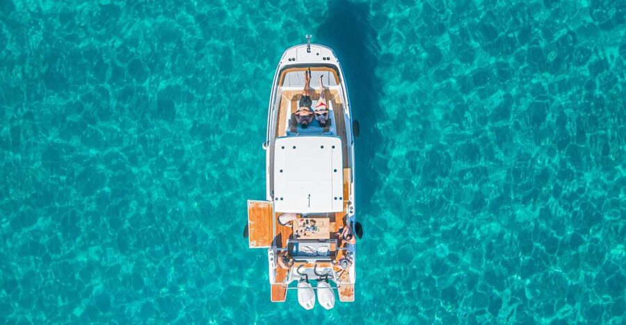 Cagliari: Luxury Motorboat Tour with 3 Swim Stops & Wine - Poetto Beach and the first view of the bay