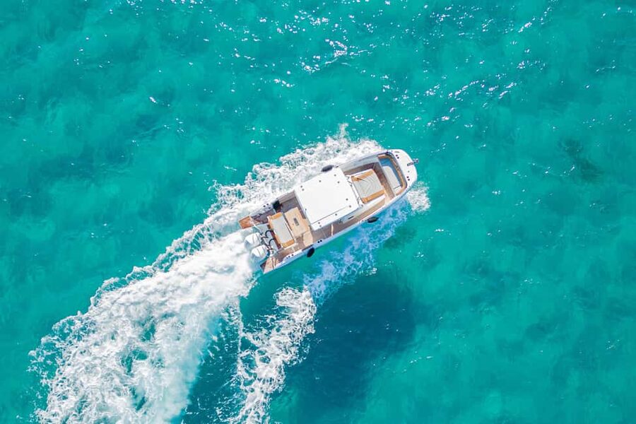 Cagliari: Luxury Motorboat Tour with 3 Swim Stops & Wine - Cala Mosca: the first chance to swim