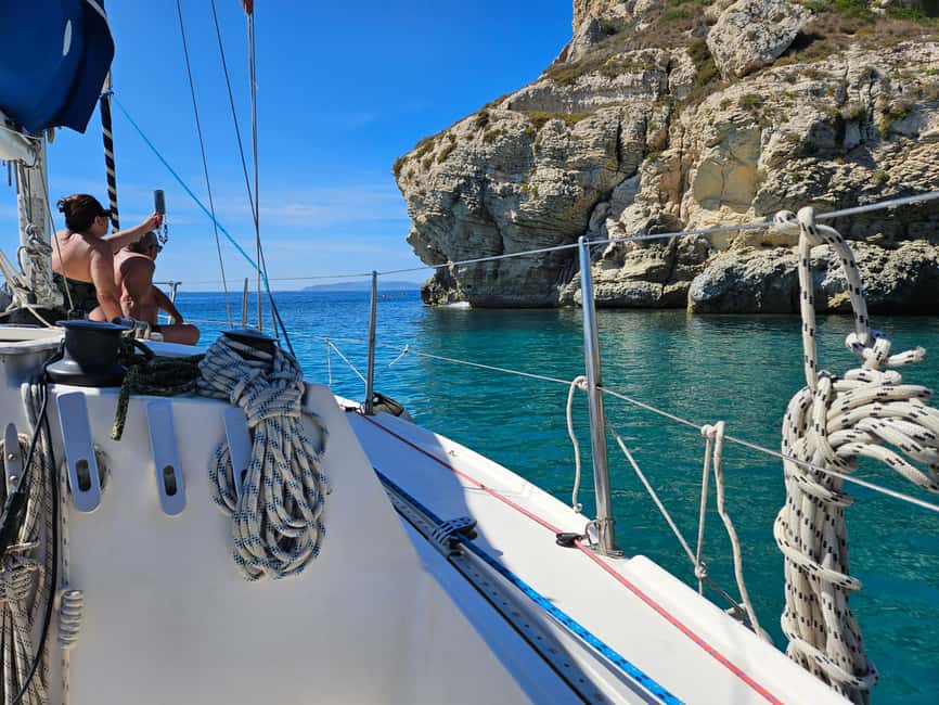 Cagliari Sailing Boat Tour with Snorkeling and Drink - Swimming and snorkeling at the cape
