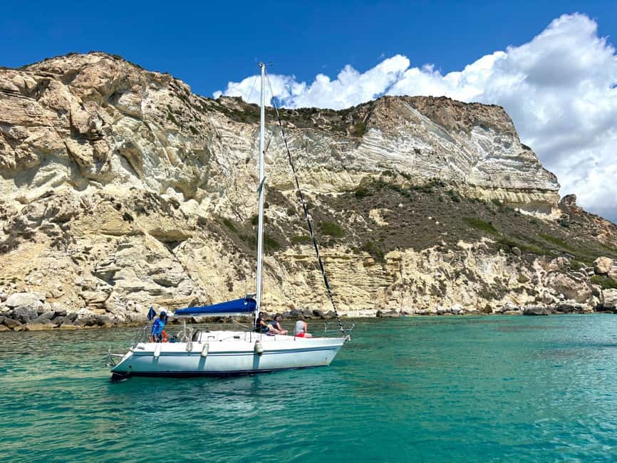 Cagliari Sailing Boat Tour with Snorkeling and Drink - Captain Maurizio’s role in the experience
