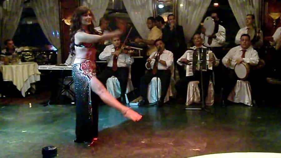 Cairo: Nile Dinner Cruise with Belly Dancer Show with Pickup - Boarding the Nile boat for a two-hour cruise