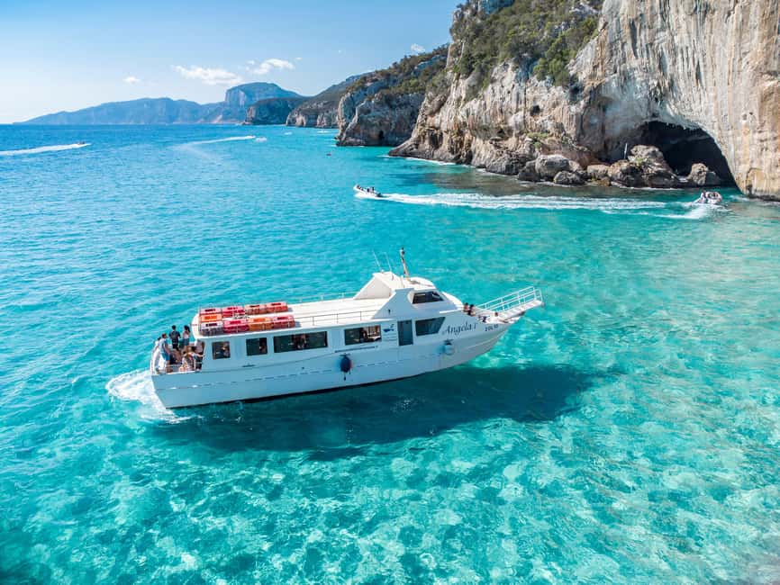 Cala Gonone: Grotta Bue Marino & Cala Luna Beach Boat Trip - Audio commentary, guides, and language limits