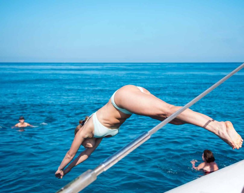 Calpe: Catamaran Tour with Optional Swim Stop - Booking, timing, and cancellation details
