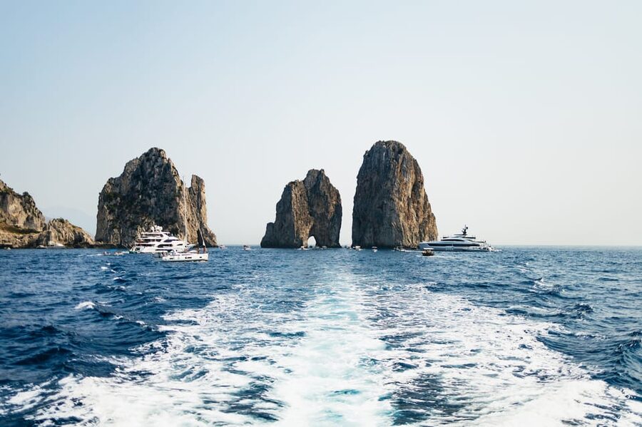 Capri: Island Boat Tour and Optional Blue Grotto Visit - Tiberius’s Leap and the eastern coast