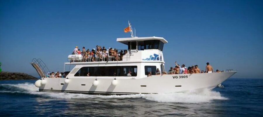 Capri: Island Boat Tour with Blue Grotto Stop - Salto di Tiberio and Capri’s northern cliffs