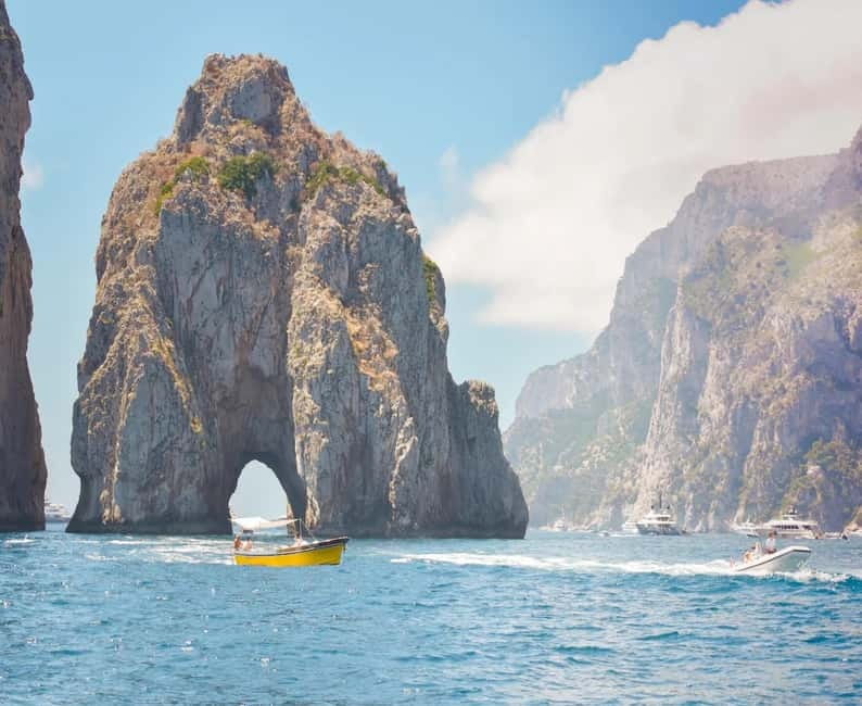 Capri: Scenic Boat Tour with Swimming, Limoncello & Snack - Salto di Tiberio and the first coastal views
