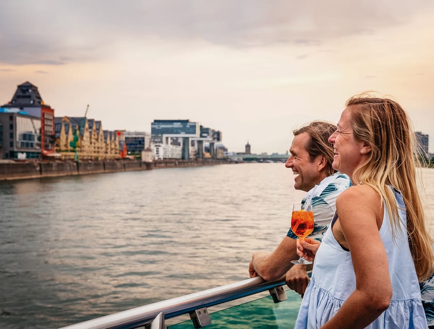 Cologne: Panoramic City Cruise - Open deck, covered seating, and table service