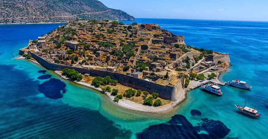 Crete: Spinalonga, Elounda, & Agios Nikolaos Boat Tour & BBQ - The early bus ride from Heraklion and the resort coast
