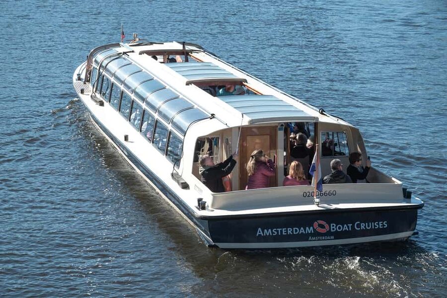 Discover Amsterdam: Luxury Canal Cruise with a Local Skipper - The Seven Bridges and Amsterdam’s old center