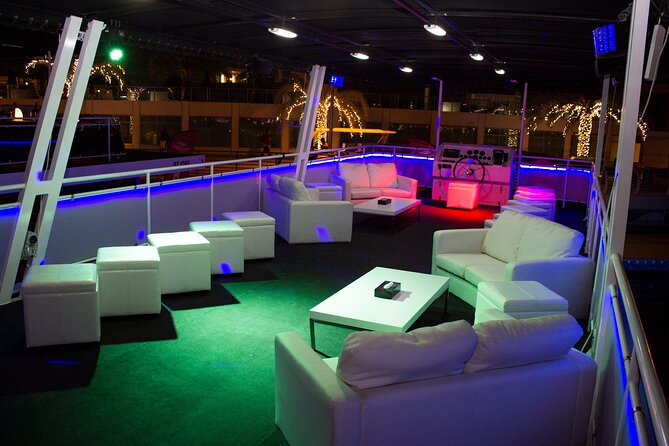 Dubai: 1-Hour Ain Boat Cruise - Open-air seating, refreshments, and onboard comfort