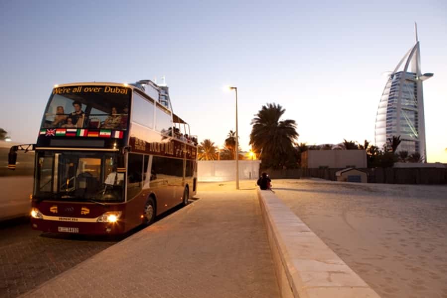 Dubai: Big Bus Panoramic Night Tour & Optional Dinner Cruise - The Palm and Atlantis from the road
