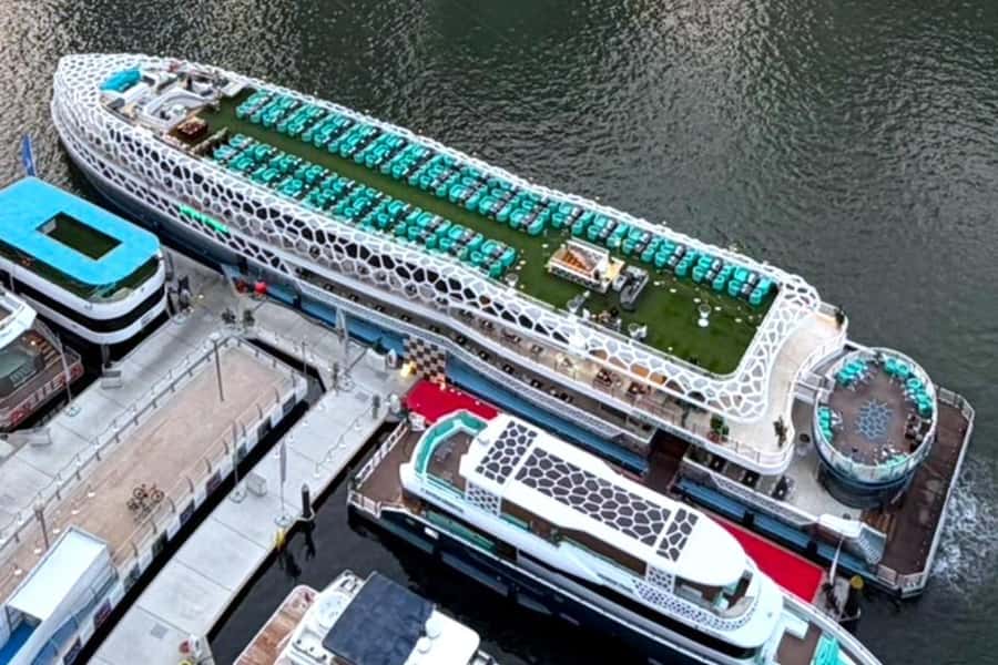 Dubai: Mega Yacht Dinner Cruise with Buffet - Tanoura dancers, aerial performers, and DJ music