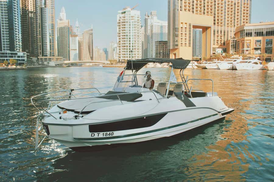 Dubai: Private Sea Escape Cruise - Swim, Tan & Sightsee - Dubai Marina, JBR, and the Dubai Eye in the first hour