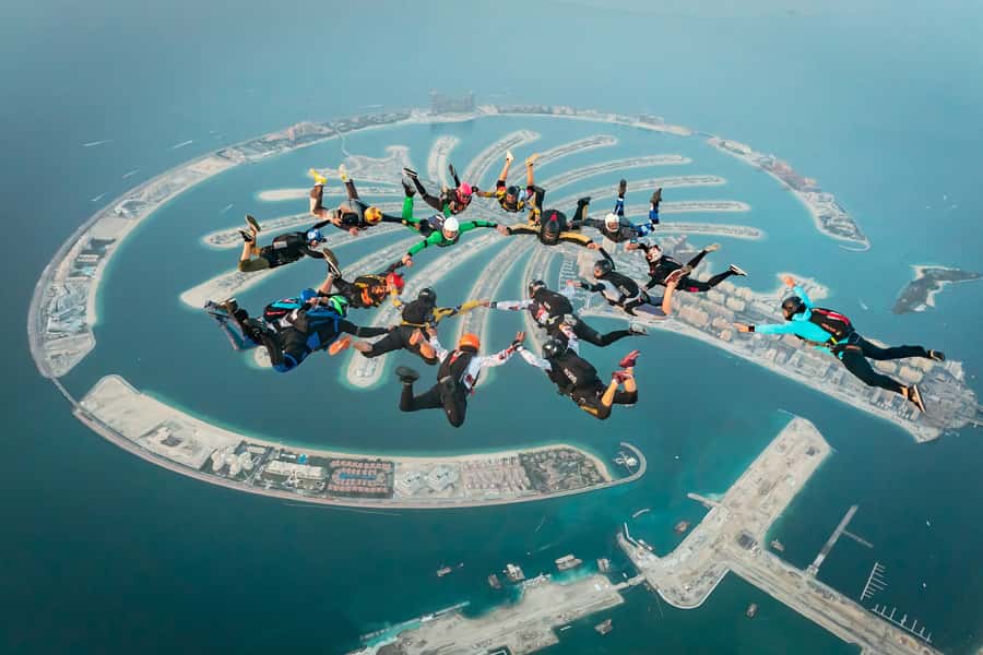 Dubai: Skydive at The Palm with Photos, Video & Yacht Tour - The parachute ride and Palm views