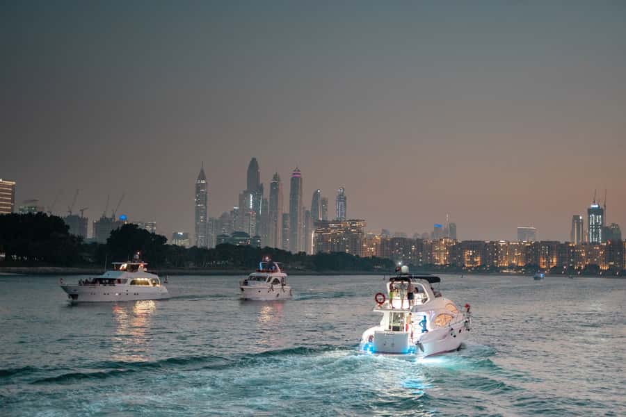 Dubai: Sunset & Night Cruise with Bites and Drinks - The mood onboard: relaxed, social, and sometimes lively