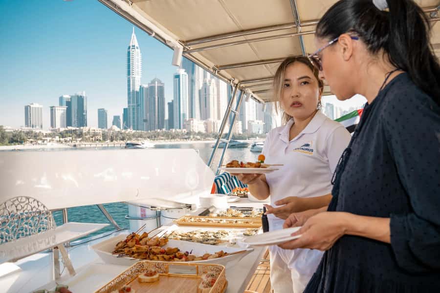 Dubai: Sunset & Night Cruise with Bites and Drinks - Finding Dubai Harbour and getting aboard