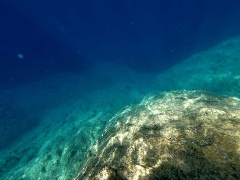 Faliraki: Boat Trip to Anthony Quinn & The Caves with Drinks - Traganou Caves: a short swim inside the rocks