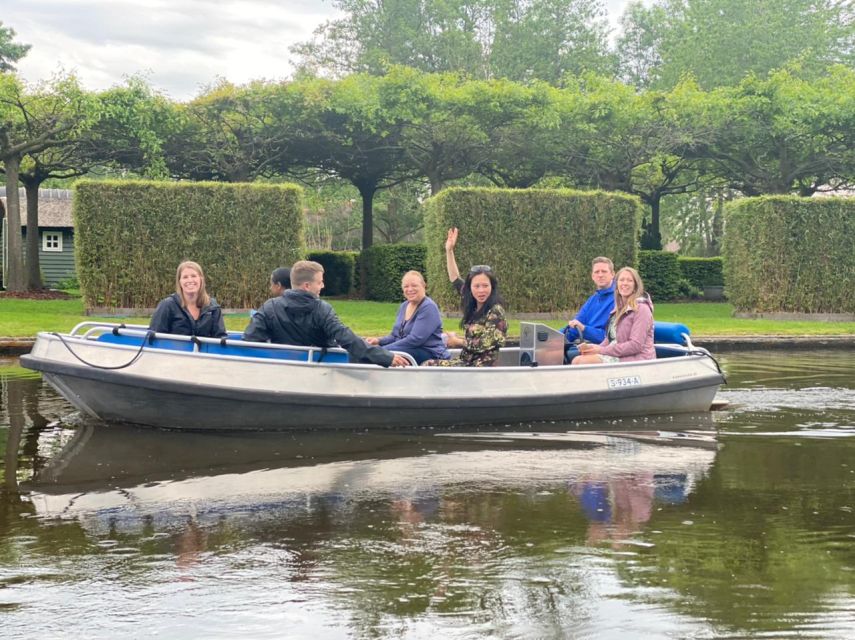 From Amsterdam: Giethoorn Day Trip with Small Electric Boat - The one-hour electric boat through Giethoorn