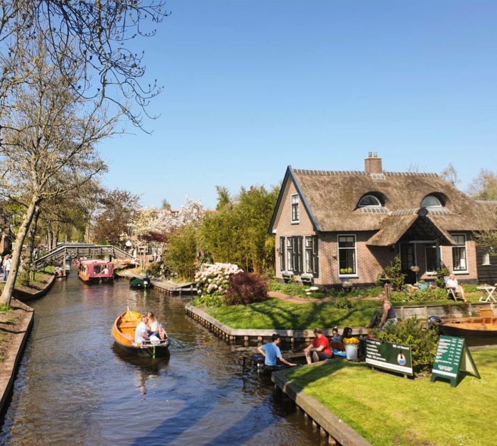 From Amsterdam: Giethoorn Day Trip with Small Electric Boat - Walking across bridges and among thatched homes