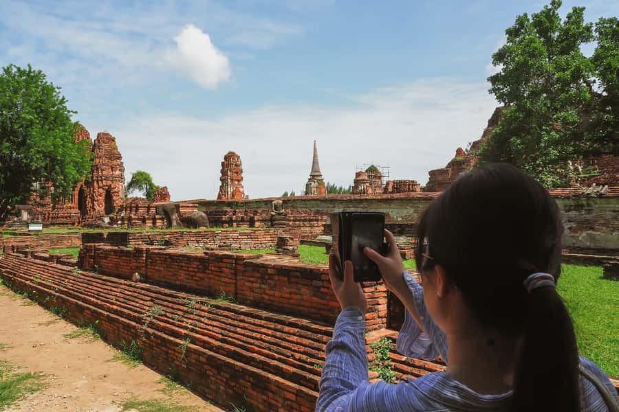 From Bangkok: Ayutthaya Day Tour by Bus with River Cruise - The guides are a major part of the experience