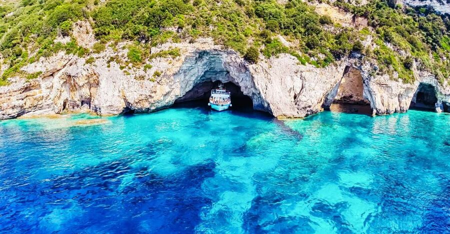 From Corfu: Day Cruise to Paxos, Antipaxos, and Blue Caves - Music, Greek dancing, and the return sailing