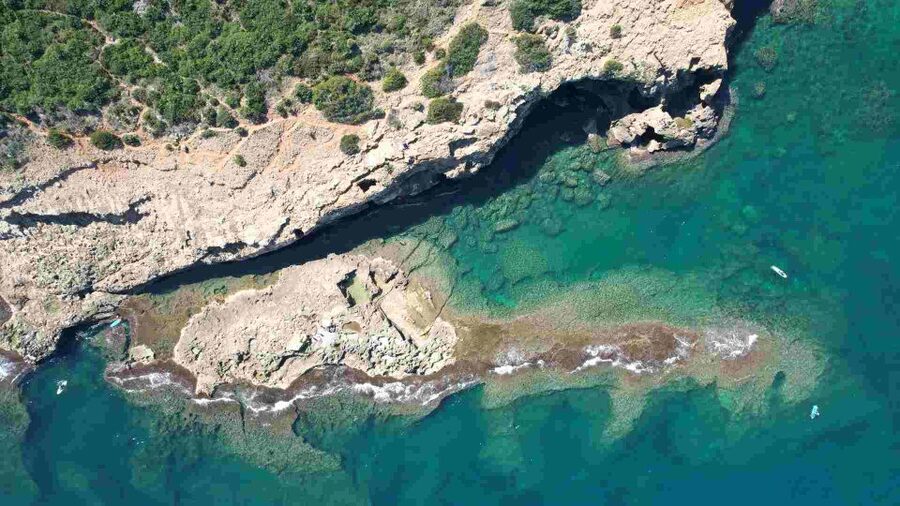 From Denia: Boat Trip to Tallada Cave with Optional Swim - Approaching Cova Tallada