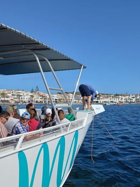 From Fornells: North Coast Beaches Cruise with Swim Stops - Cavalleria Lighthouse and the northern cliffs