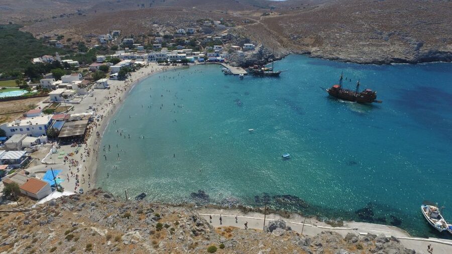From Kos: 3-Island Pirate Cruise with Lunch and Waterslide - Music, crew energy, and the pirate theme