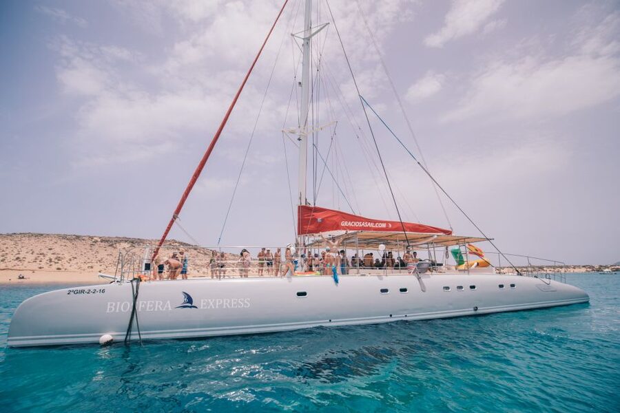 From Lanzarote: Sailing Day Trip Around La Graciosa - Boarding the catamaran in La Graciosa