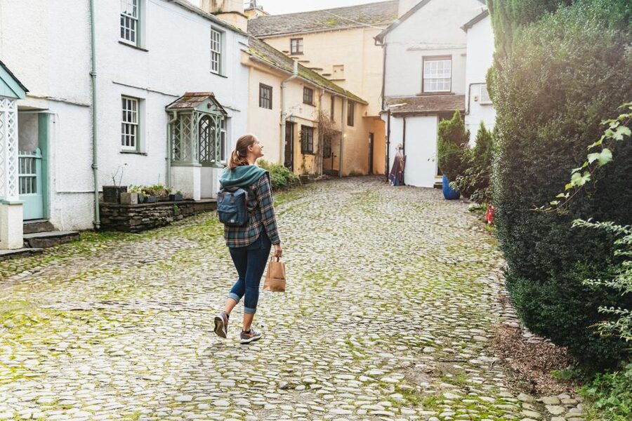 From Manchester: Lake District Bus Tour & Windermere Cruise - Coniston Water and the road through the fells