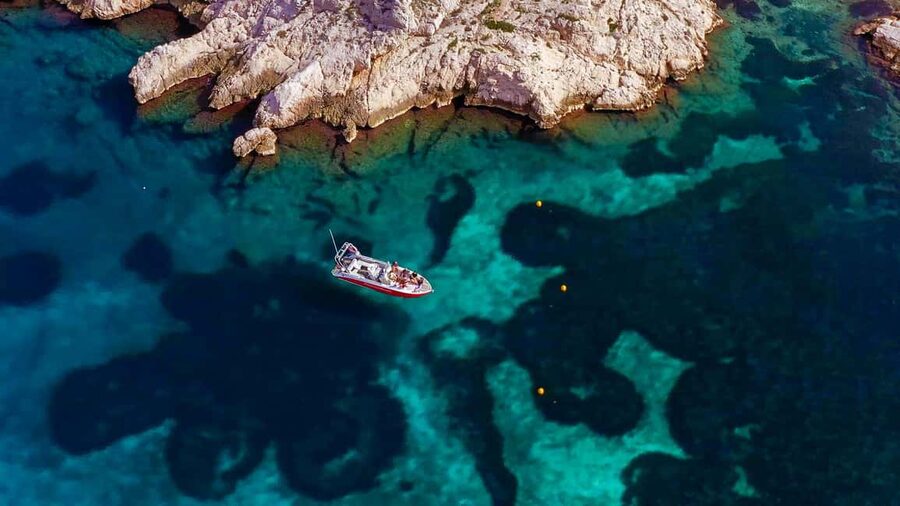 From Marseille: Iconic Calanques Boat Tour with Swimming - Swimming, snorkeling, and the Blue Cave