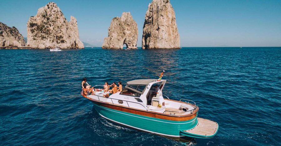 From Naples: Capri Boat Day Trip with Drinks - Boarding a traditional Sorrento boat