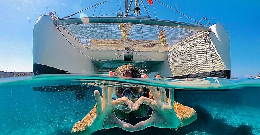 From Palau: Maddalena Archipelago Catamaran Tour with Lunch - Leaving Palau on a 12-person catamaran