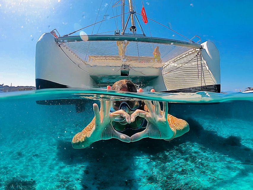 From Palau: Maddalena Archipelago Catamaran Tour with Lunch - Sailing among Spargi, Budelli, and Santa Maria
