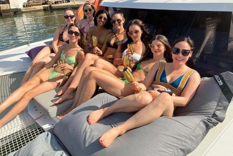 From Palma: Luxury Catamaran Group Tour with Tapas & Drinks - Anchoring in a turquoise bay